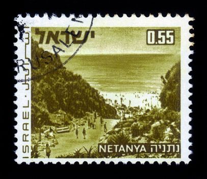 ISRAEL - CIRCA 1971: A stamp printed in Israel shows beach of resort Netanya on the Mediterranean Sea, Israel , series landscapes of Israel, circa 1971