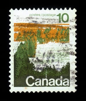 CANADA - CIRCA 1972: A stamp printed in Canada shows winter forest, central Canada, circa 1972.