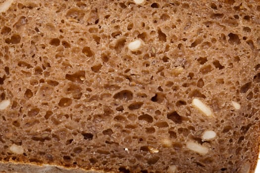 Slice of dark bread isolated over white 