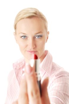 Close-up portrait of the blonde giving the lipstick