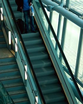 escalatorl of airport gate with architecture