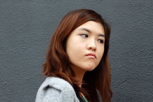 Asian woman with angry face