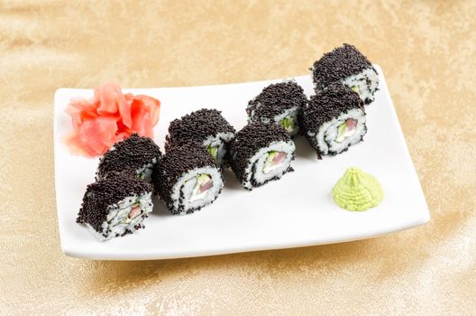 sushi roll with tuna, avacado, sauce and flying fish roe