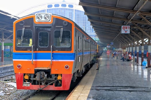 Thai Red Sprinter train, Diesel locomotive, on Bangkok railway station Thailand