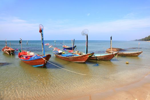 fisherman long tail boat park at the Rayong beach in Thailand