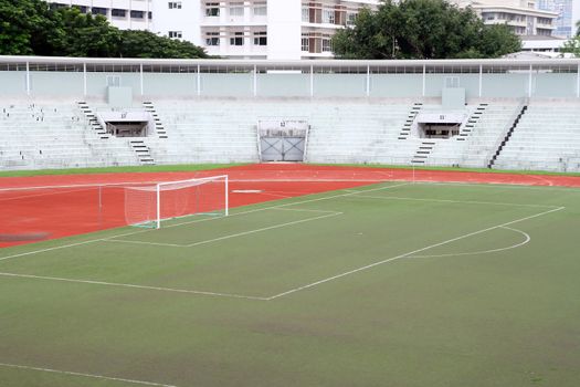 soccer football goal with penalty area on fake grass pitch