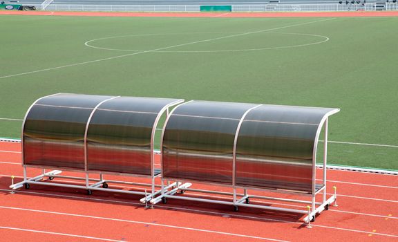 Coach and reserve benches in football stadium