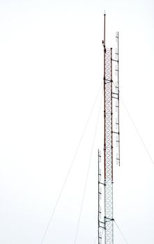 Telecommunication Radio antenna isolated on White sky
