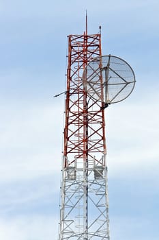 Satellite Dish on Telecommunication Radio antenna Tower with blue sky