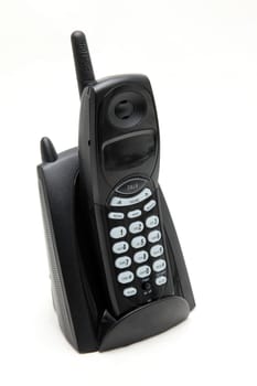isolated black cordless phone on white side perspective