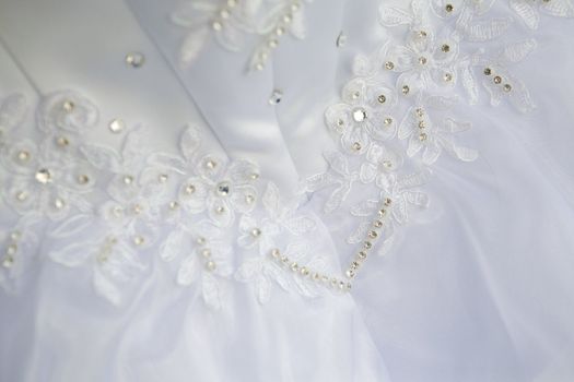 part of a wedding dress with artificial flowers