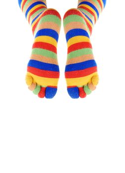 Two legs of the clown on a white background