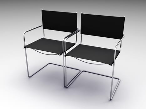 two black chairs on grey background