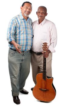 Two smiling old men pause for a moment with their guitar and microphone in rest mode.