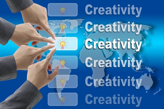 male business hand pushing on Creativity button with world map background