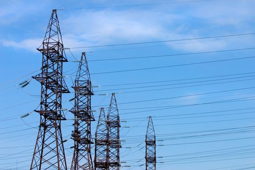 Transmission line on a background of the blue sky