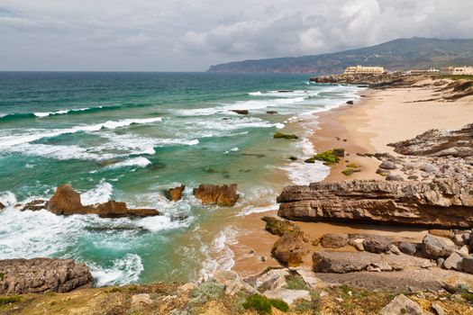 Beach on Atlantic Ocean Coast in Stormy weather near Lisbon, Portugal