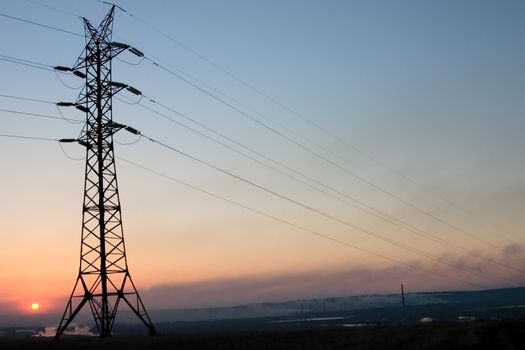 Transmission line on a background of the coming sun