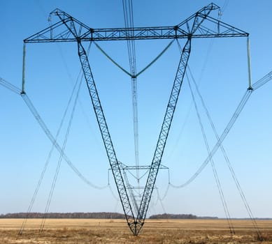 Transmission line on a background of the blue sky