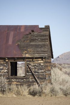 an old rusty shack in the desert.
