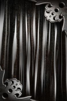 Metal on black silk curtain