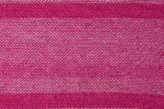 Pink fabric background with stripes texture.