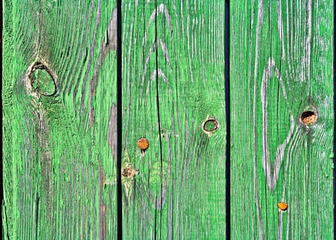 Old Wood Background. Old wooden boards painted in green