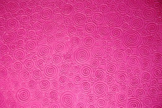 Concave spherical pink background.