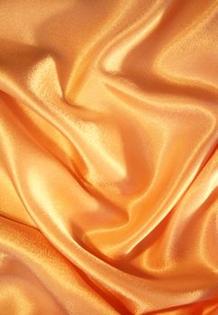 Smooth elegant gold satin can use as background

