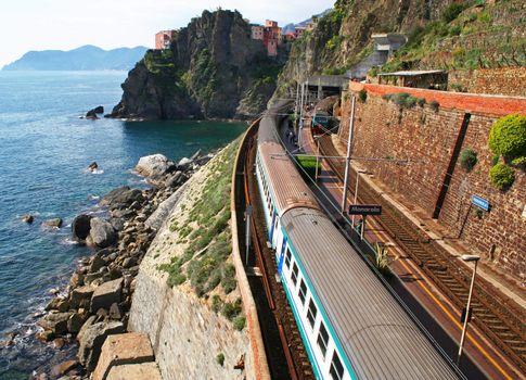 Italy. Cinque Terre. Train at station Manarola 