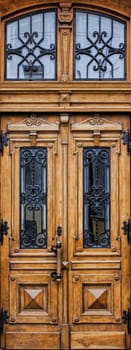 Wooden doors in old building in  Lviv (Ukraine)