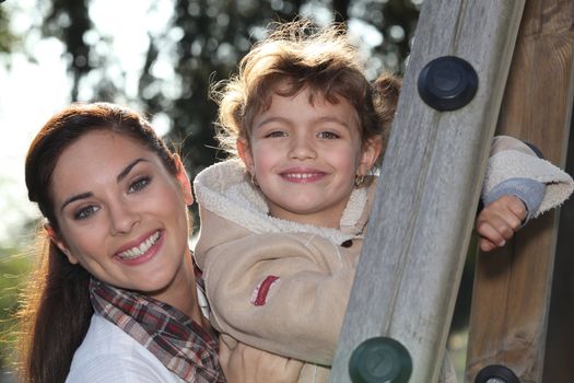 mother and daughter together in the playground