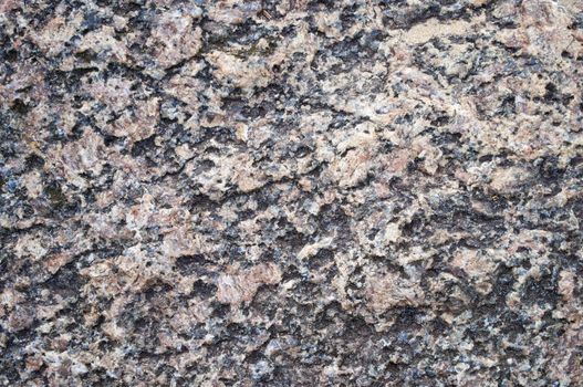 Close up of granite rock background texture