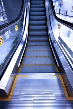 Moving escalator in a subway station