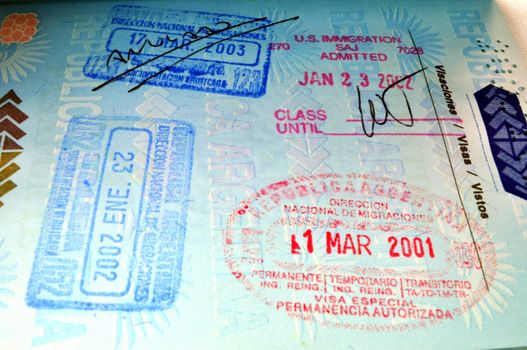 Migration stamps on passport.