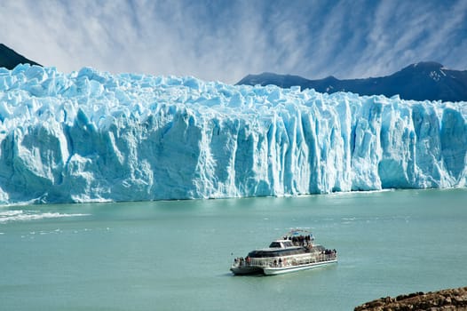 Boat sailing near Perito Moreno glacier, in Patagonia, Argentina.