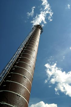 Factory details on a background of the sky