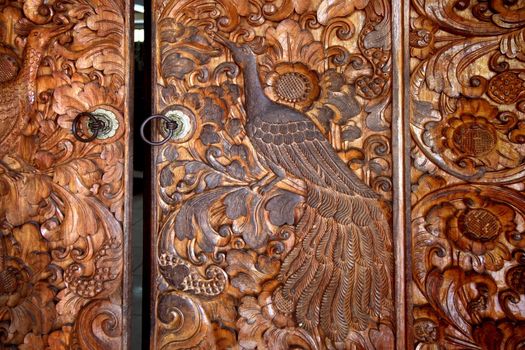 Wooden door decorated with a groove
