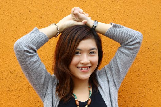 Beautiful and young asian woman smiling