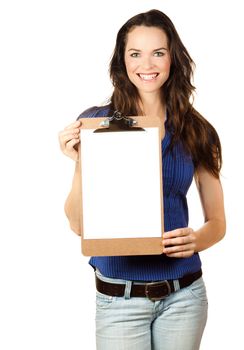 Beautiful young woman smiling and holding up a blank clipboard