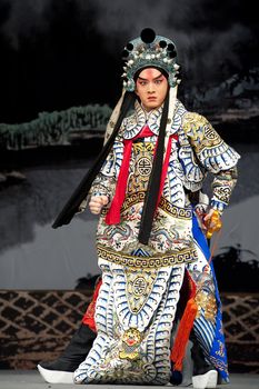 CHENGDU - MAY 30: chinese Beijing opera performer make a show on stage to compete for awards at Shengge theater in 25th Chinese Drama Plum Blossom Award competition.May 30, 2011 in Chengdu, China.
Chinese Drama Plum Blossom Award is the highest theatrical award in China.
