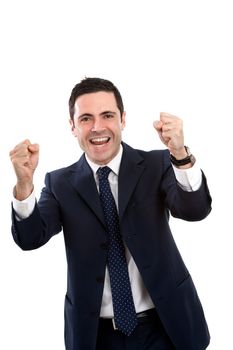 Handsome young business man in blue suit expressing a cry for victory. Isolated on white.