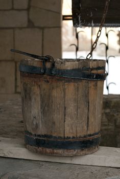 an old wooden bucket for the well