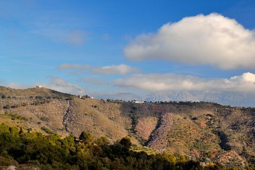 peaks of mountains in the north we go out of Malaga