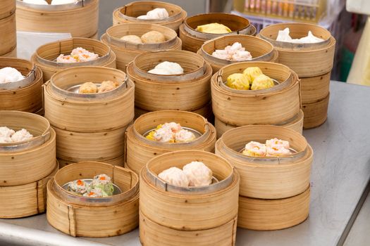 Steamed Dim Sum in Bamboo Trays by Local Street Food Vendors in Melaka Malaysia