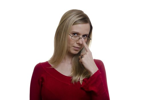 young blonde woman touching her glasses on white background