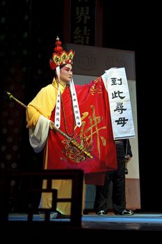 CHENGDU - JUN 6: Mulian Drama of Chinese Qi opera performer make a show on stage to compete for awards in 25th Chinese Drama Plum Blossom Award competition at Experimental theater.Jun 6, 2011 in Chengdu, China.