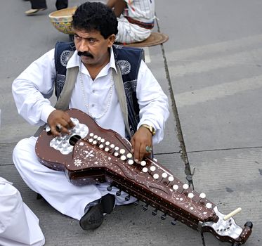 CHENGDU - MAY 23: Folk music show of Pakistani performer in the 1st International Festival of the Intangible Cultural Heritage China,2007 on May 23, 2007 in chengdu, china.