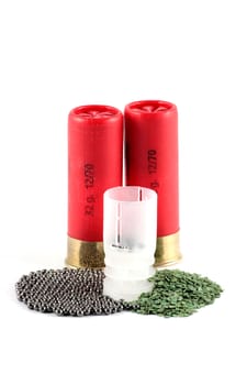 highspeed red cartridges twelvegauge seventy thirtytwo grams with gunpowder and ammunition taco on a white background