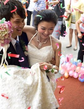 a young couple on their wedding day